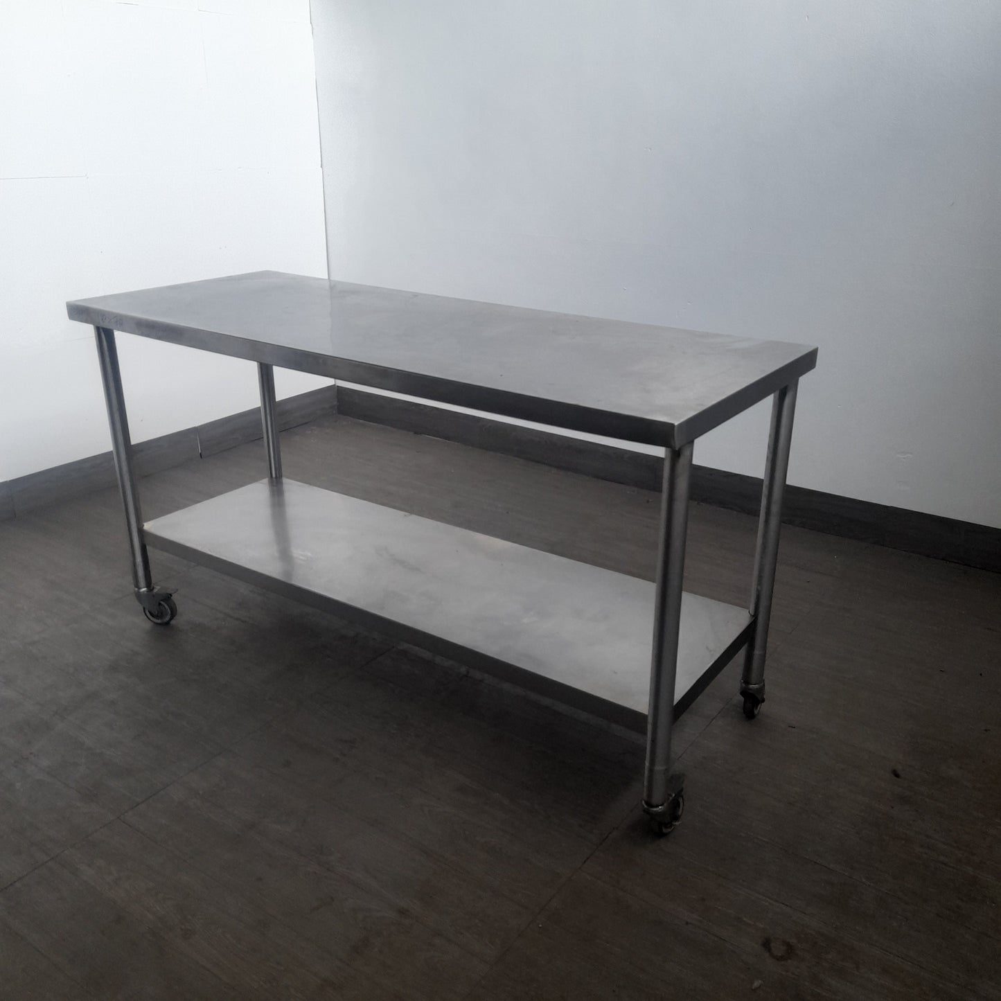 Tavolo con ruote in acciaio aisi 304 usato misure L 180 P 70 Alto 85 Attrezzatura da ristorazione usata Sd Service Store