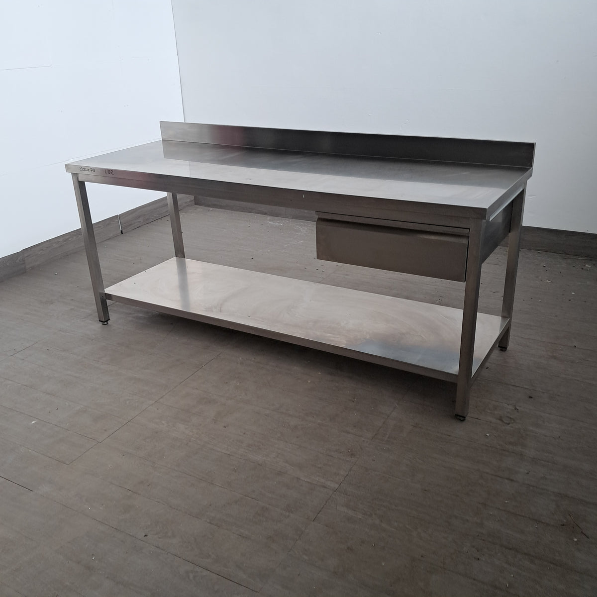 Tavolo in acciaio inox AISI 304 con 1 cassetto, L 200 cm, P 70 cm, H 85 cm — usato Attrezzatura da ristorazione usata Sd Service Store