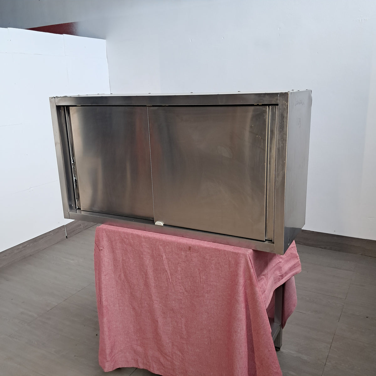 Pensile in acciaio Aisi 304  con 2 porte scorrevoli  L 120 P 40 H 64